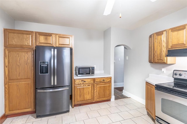 kitchen featuring custom range hood and stainless steel appliances