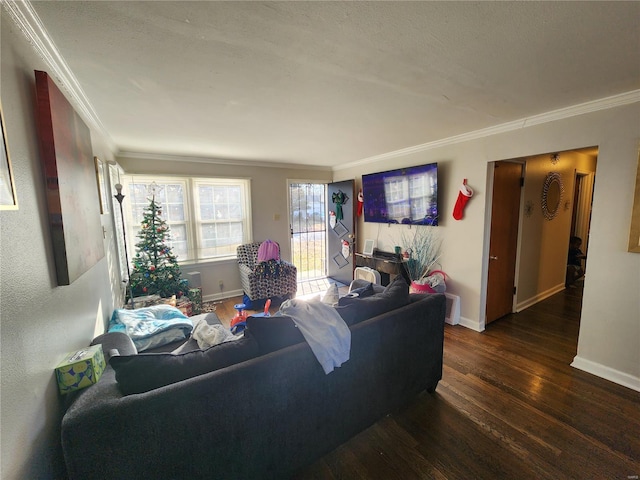 living room with crown molding, dark wood finished floors, and baseboards