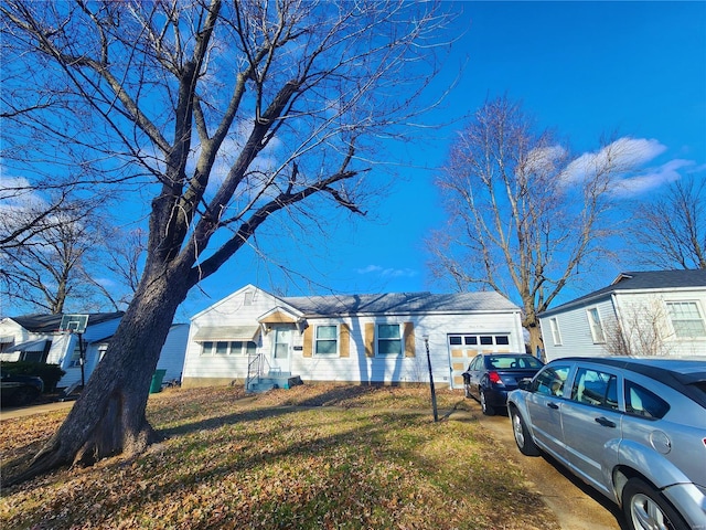 single story home featuring a garage