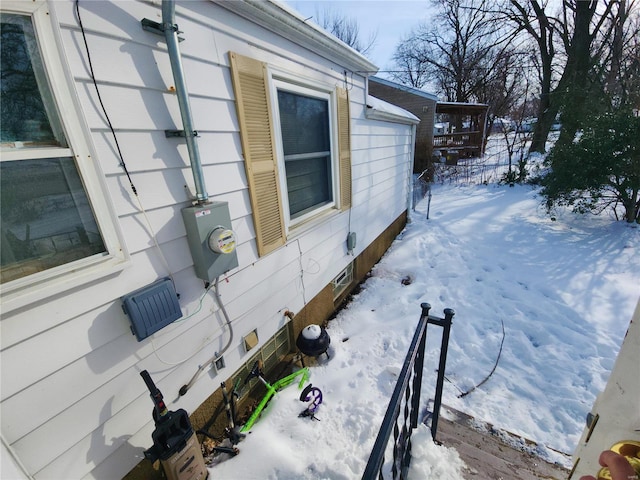 view of snow covered property