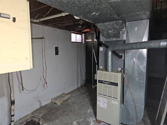 utility room with heating unit