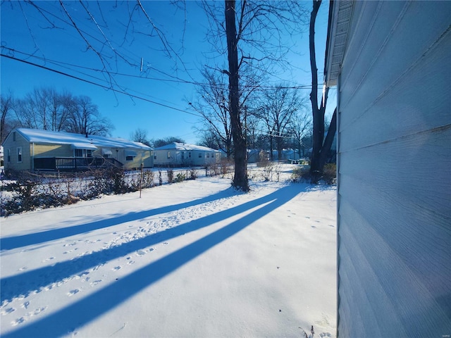 view of snowy yard