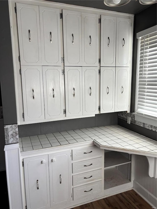 mudroom with dark hardwood / wood-style floors