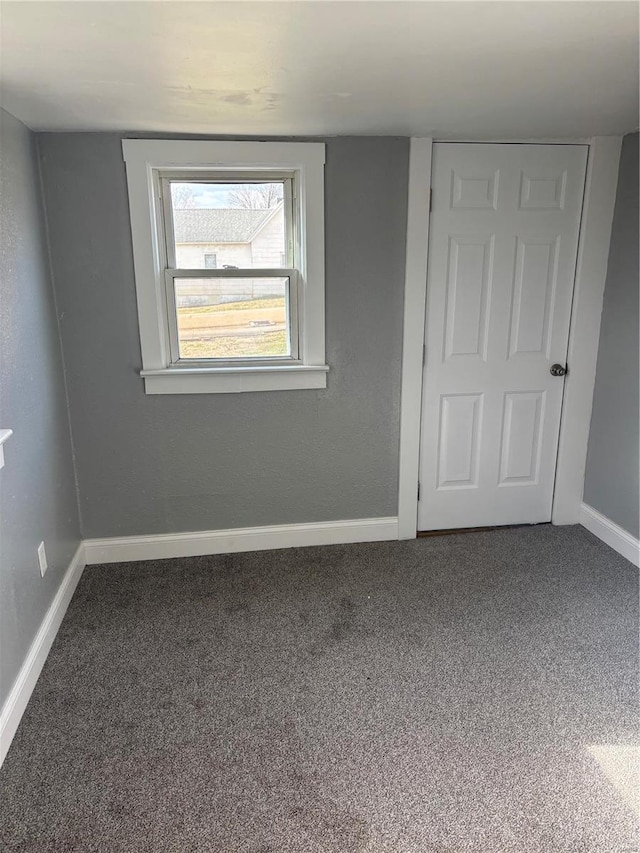 unfurnished bedroom with carpet