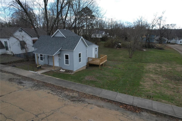 exterior space featuring a front yard