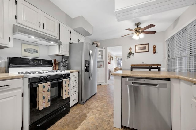 kitchen with ceiling fan, light tile patterned flooring, white cabinetry, and appliances with stainless steel finishes