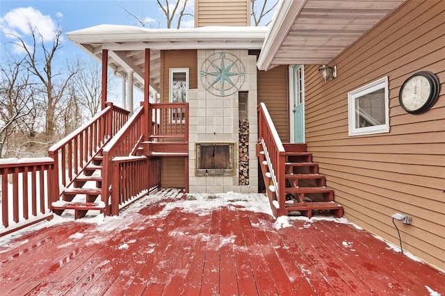 view of snow covered property entrance