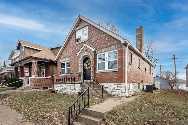 view of front of home featuring central AC unit