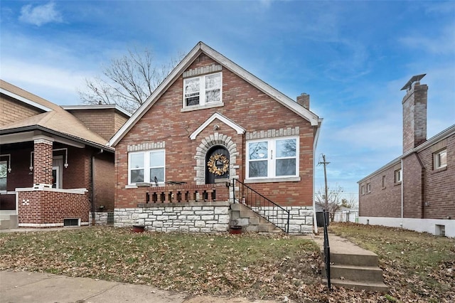 view of front of property with brick siding