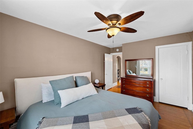 bedroom featuring ceiling fan and hardwood / wood-style floors