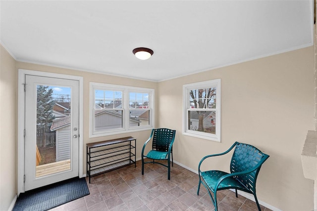 sitting room with ornamental molding