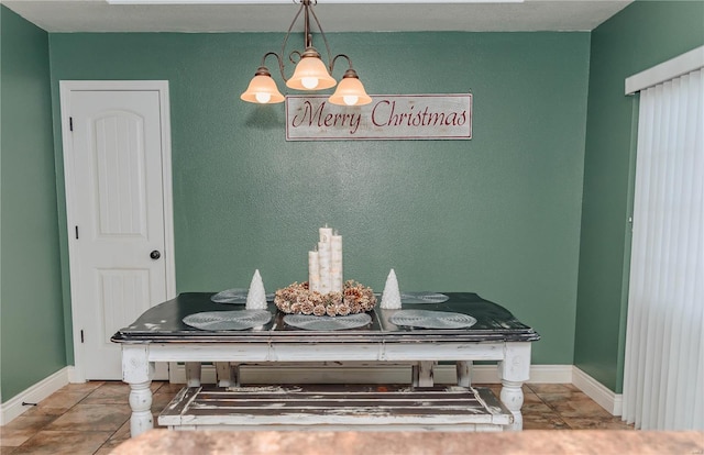 dining space with tile patterned flooring