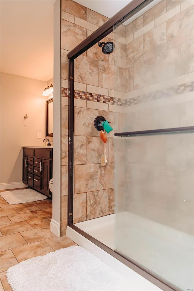 bathroom featuring vanity and walk in shower