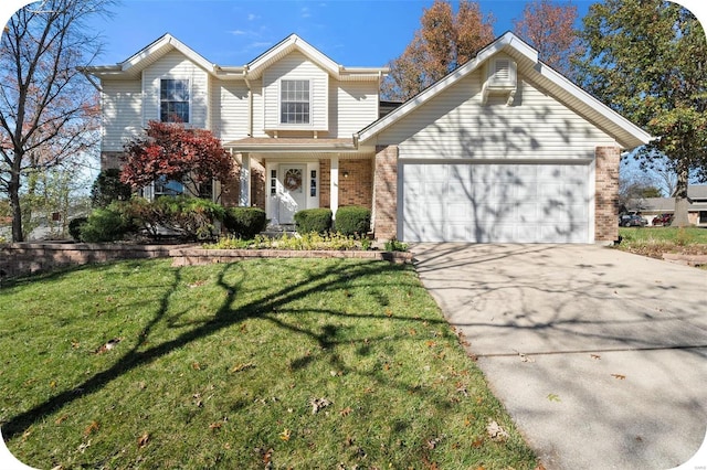 front of property featuring a garage and a front lawn