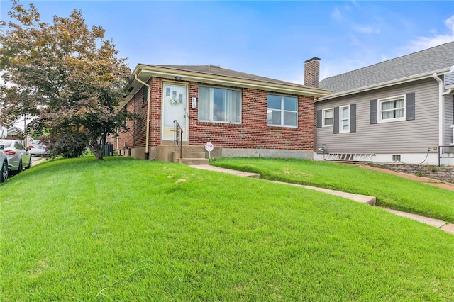 view of front facade with a front yard