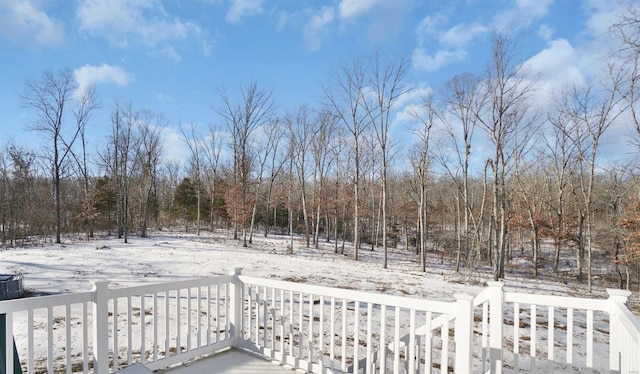 view of snow covered deck