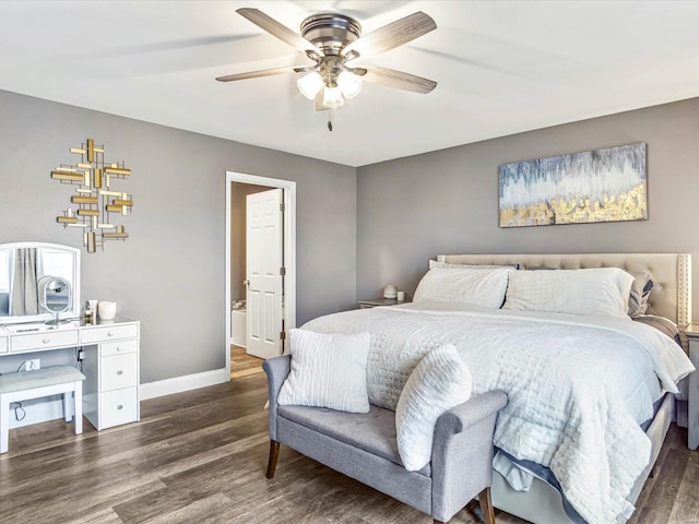 bedroom with ceiling fan and dark hardwood / wood-style flooring