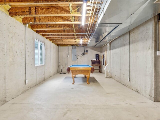 basement with electric panel and pool table