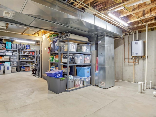 basement with tankless water heater and heating unit