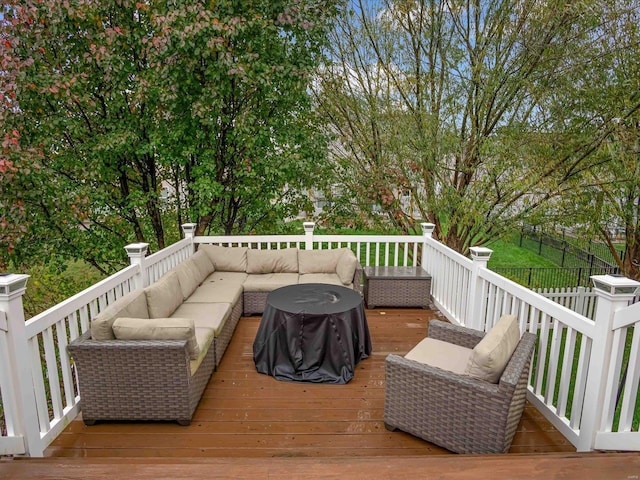 wooden deck with outdoor lounge area