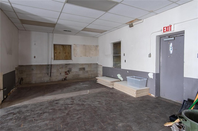 miscellaneous room with a paneled ceiling