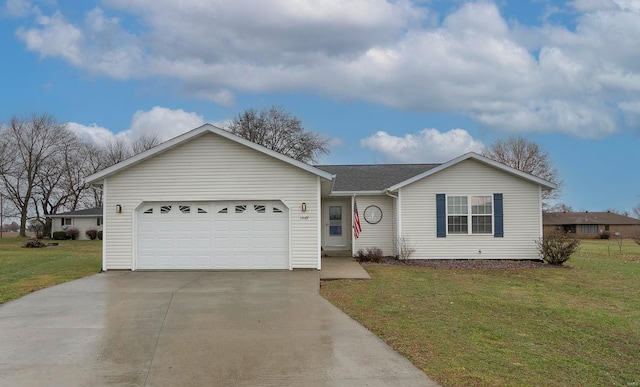 ranch-style house with a garage and a front lawn