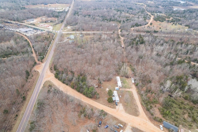 birds eye view of property with a rural view