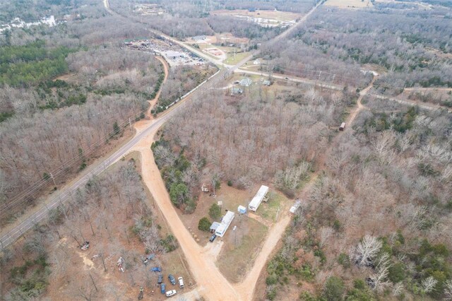 birds eye view of property featuring a rural view