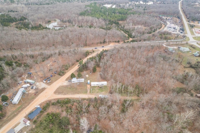 birds eye view of property with a rural view