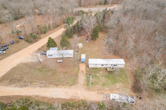 birds eye view of property featuring a rural view