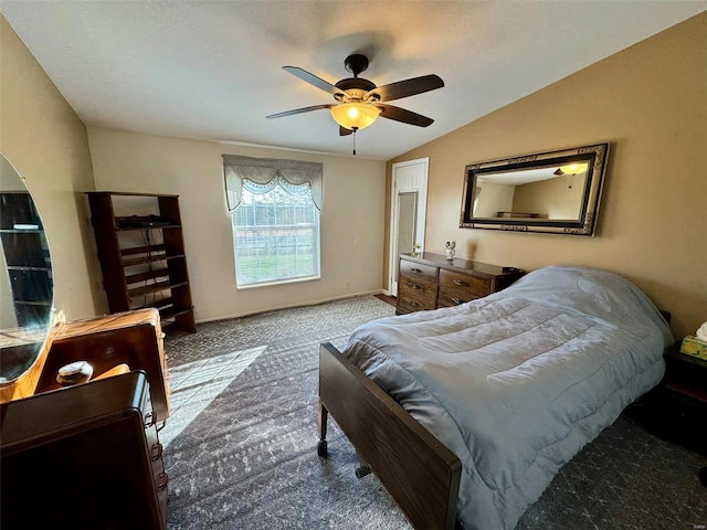 bedroom with carpet, vaulted ceiling, and ceiling fan