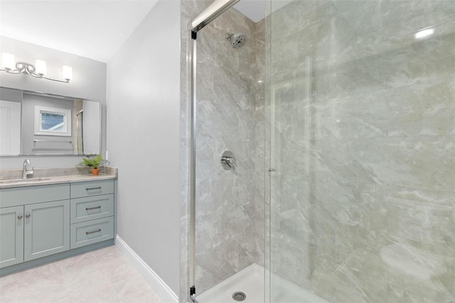 bathroom with vanity, tile patterned floors, and walk in shower