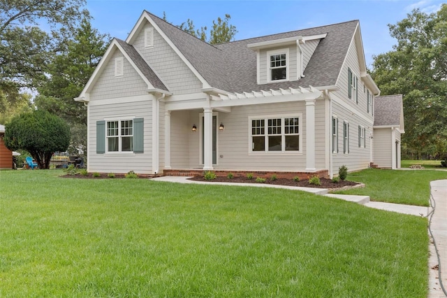 view of front of property with a front lawn