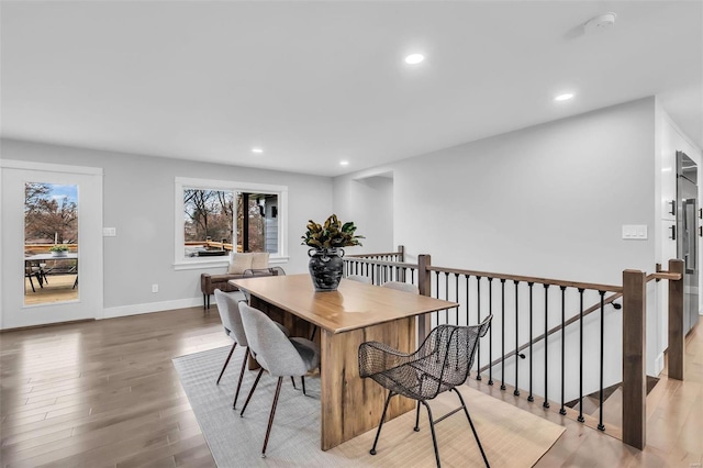 dining area with light hardwood / wood-style flooring