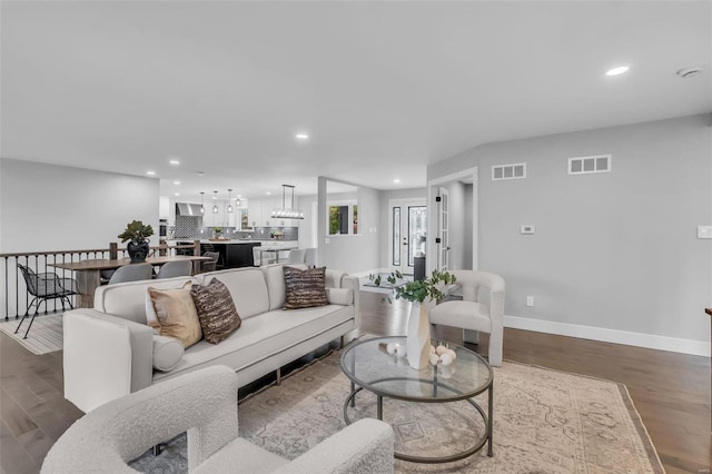 living room with wood-type flooring