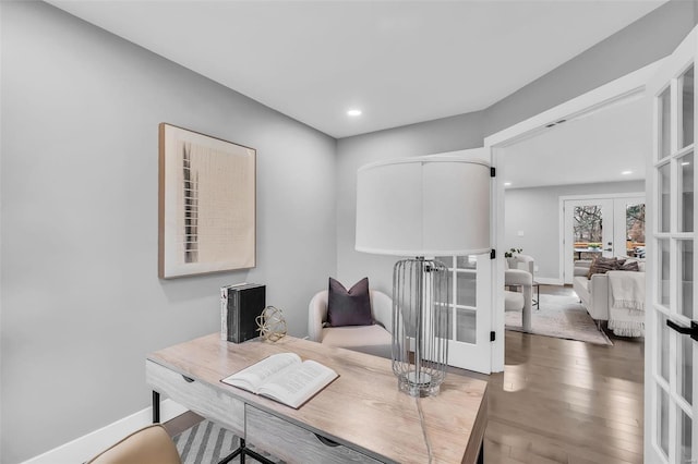 office featuring french doors and wood-type flooring