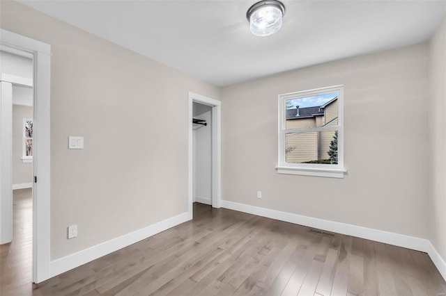 unfurnished bedroom featuring light hardwood / wood-style flooring