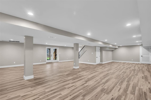 basement featuring light wood-type flooring