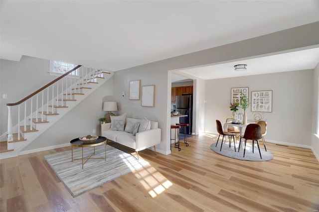 living room with light wood-type flooring