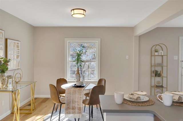 dining space featuring light hardwood / wood-style flooring