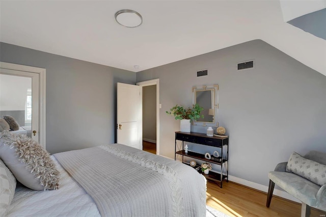 bedroom featuring hardwood / wood-style floors