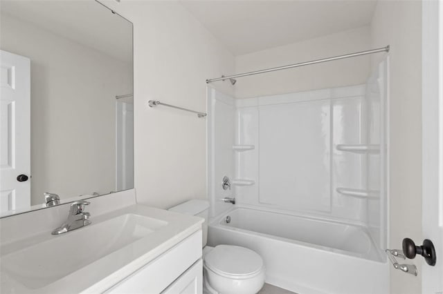 full bathroom with bathtub / shower combination, vanity, and toilet