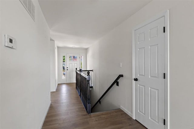 hallway featuring dark wood-type flooring