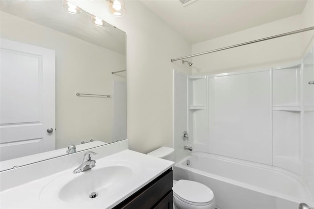 full bathroom featuring vanity, shower / bath combination, and toilet