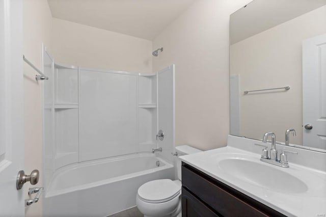 full bathroom with washtub / shower combination, vanity, and toilet