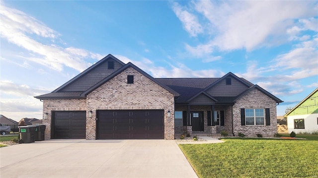 craftsman-style house with a front yard and a garage