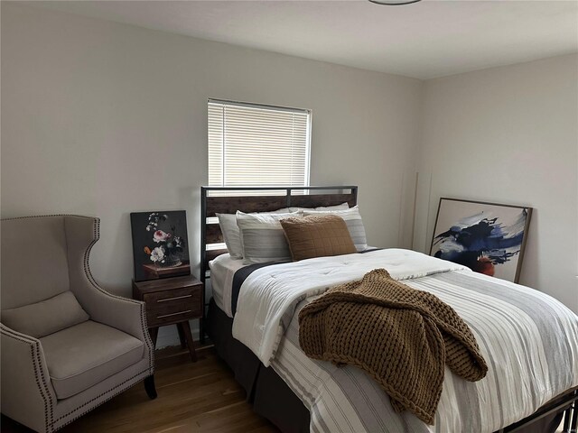 bedroom featuring hardwood / wood-style flooring