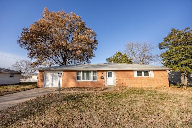 single story home with a garage and a front lawn