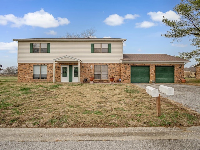 view of front facade featuring a front yard and a garage