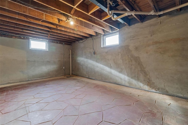 basement featuring plenty of natural light